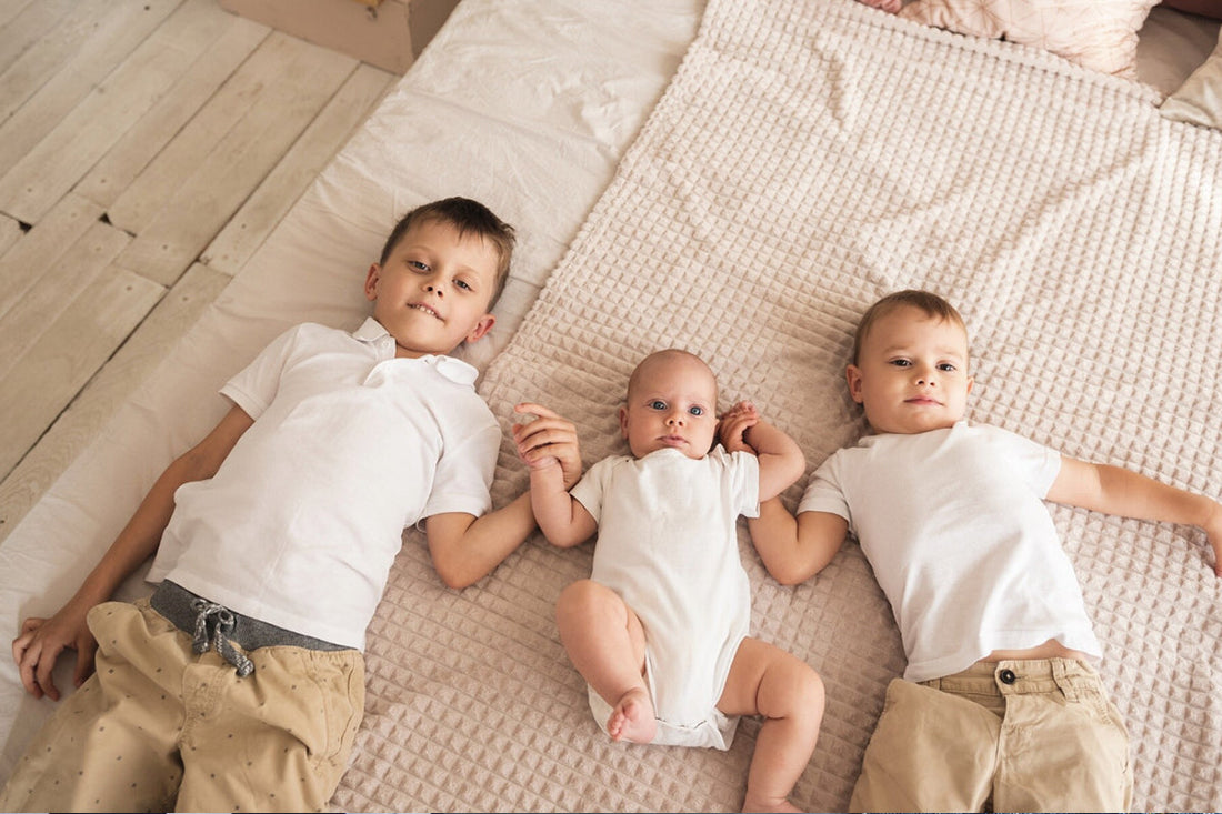 Organic cotton and bamboo fiber baby rompers side by side comparison