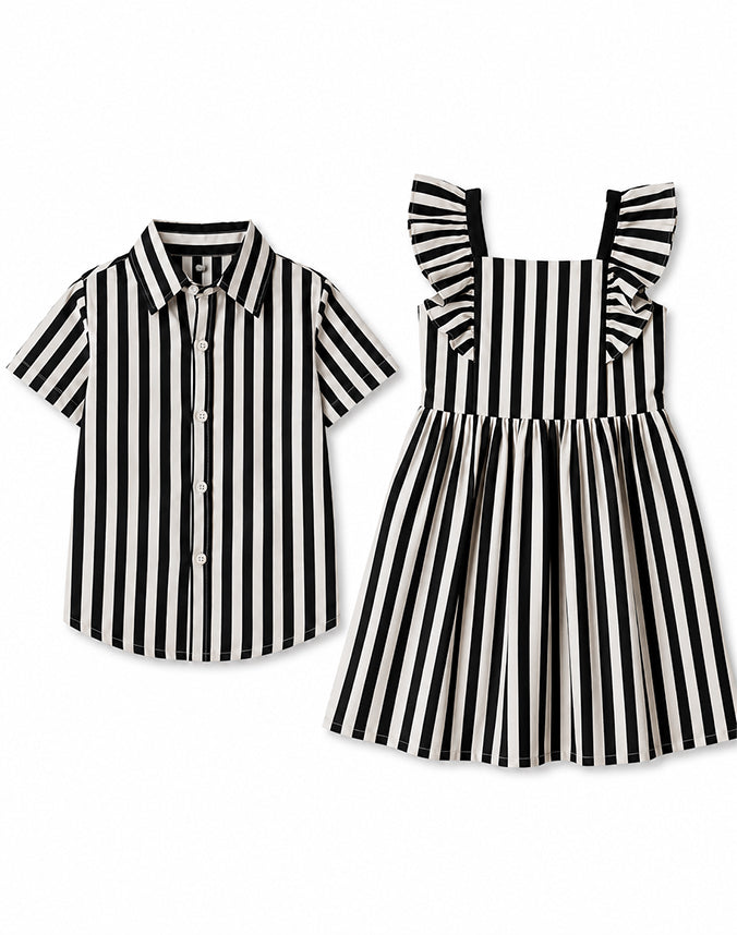 Sibling matching black and white striped set boy shirt and girl dress flat lay - Alice Apparel