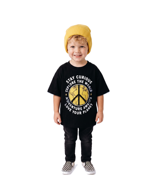 Boy wearing black Explore the World graphic short sleeve T-shirt