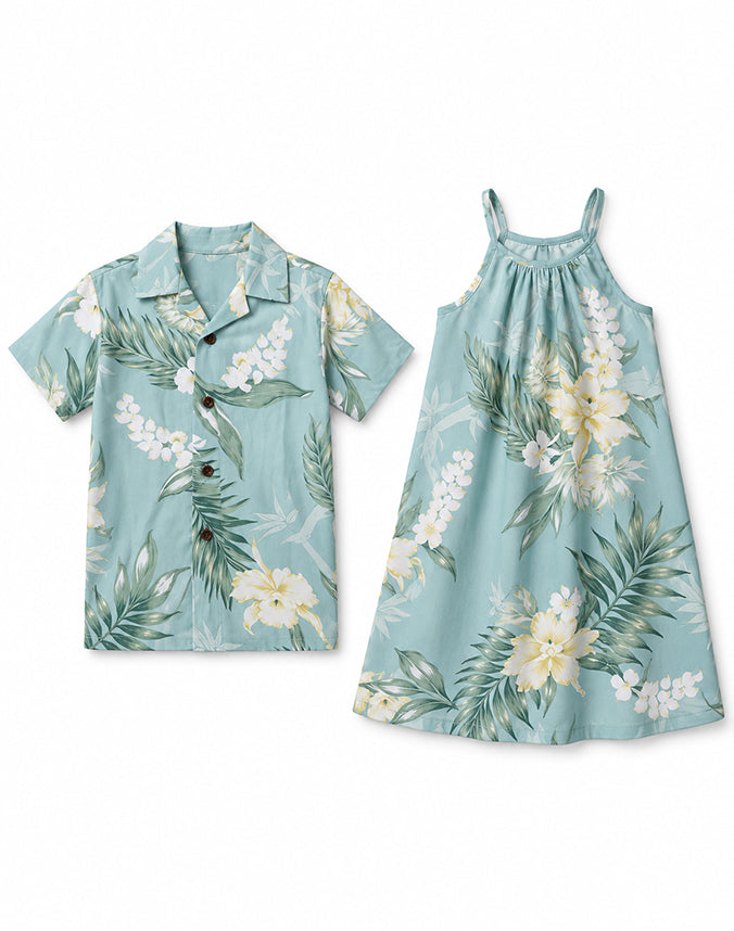 Sibling matching Hawaiian tropical floral set boy shirt and girl dress flat lay - Alice Apparel