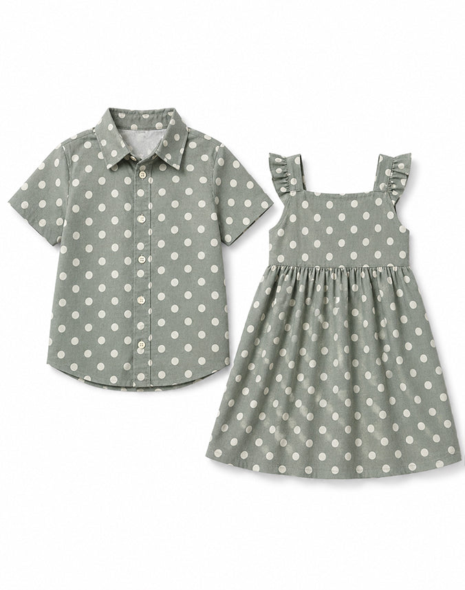 Sibling matching polka dot set sage green boy shirt and girl dress flat lay - Alice Apparel