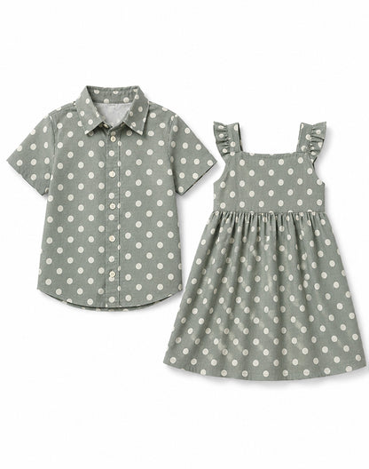 Sibling matching polka dot set sage green boy shirt and girl dress flat lay - Alice Apparel