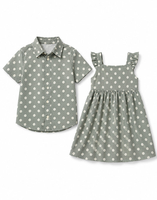 Sibling matching polka dot set sage green boy shirt and girl dress flat lay - Alice Apparel