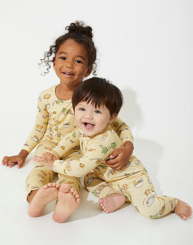 Toddler and baby wearing bamboo viscose breakfast print zip sleepsuits - Alice Apparel