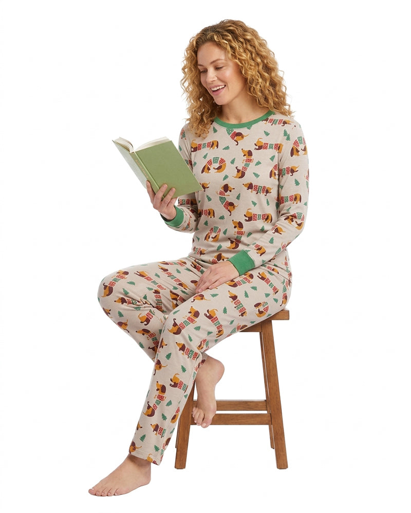 Woman wearing matching printed two-piece pajama set