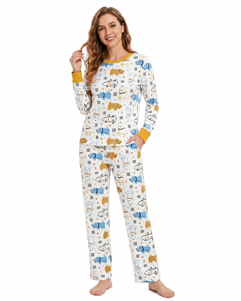 Woman wearing playful print long sleeve pajama set
