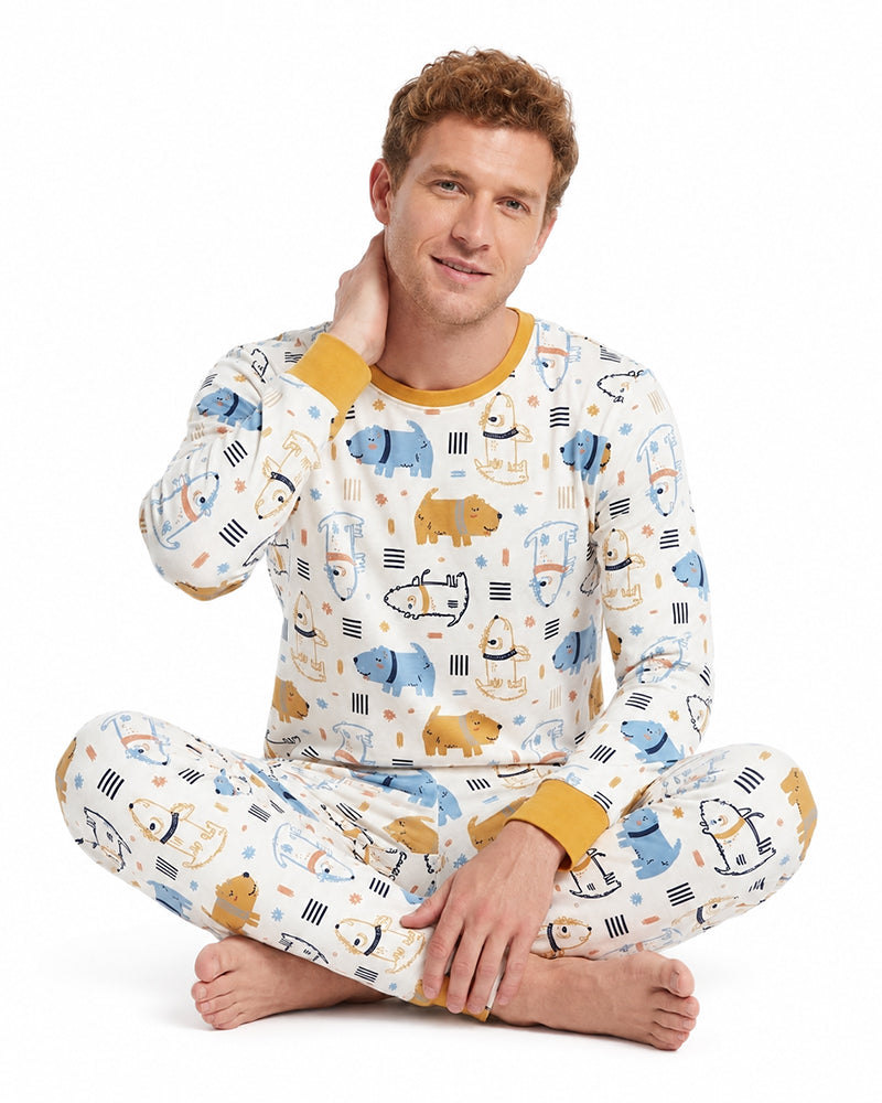 Man wearing matching multicolor printed two-piece pajamas