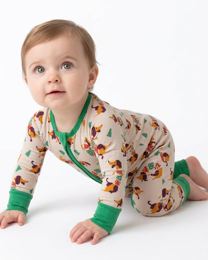 Baby crawling in cartoon print zip-front pajama romper