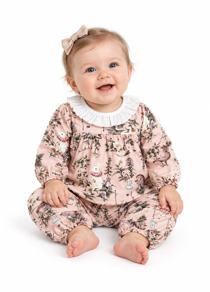 Baby wearing bamboo viscose pajama set from custom clothing manufacturer