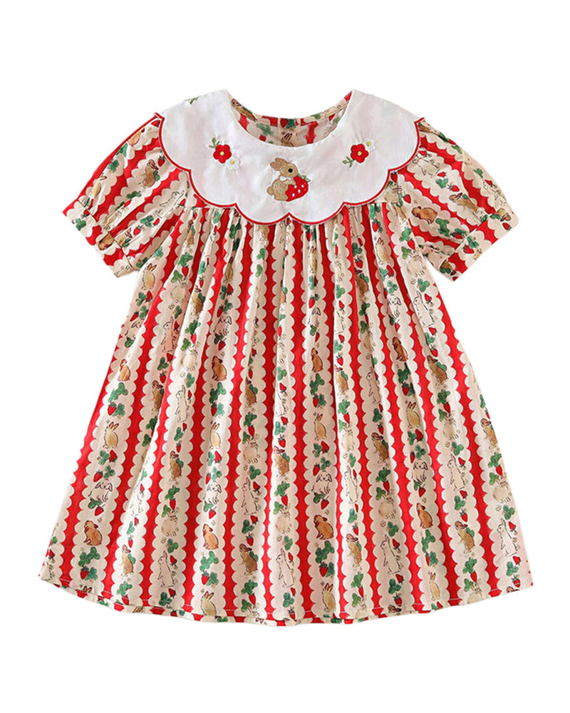 Back view of a girls striped cotton dress with a gathered waist and short sleeves