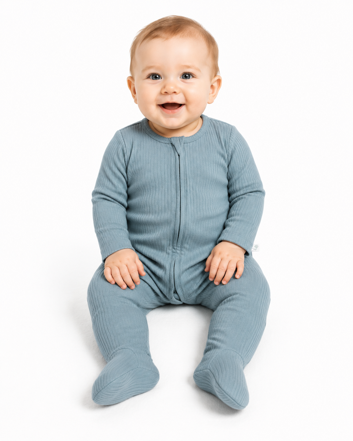 Baby wearing dusty blue ribbed zipper footed romper, organic cotton long sleeve footed baby onesie