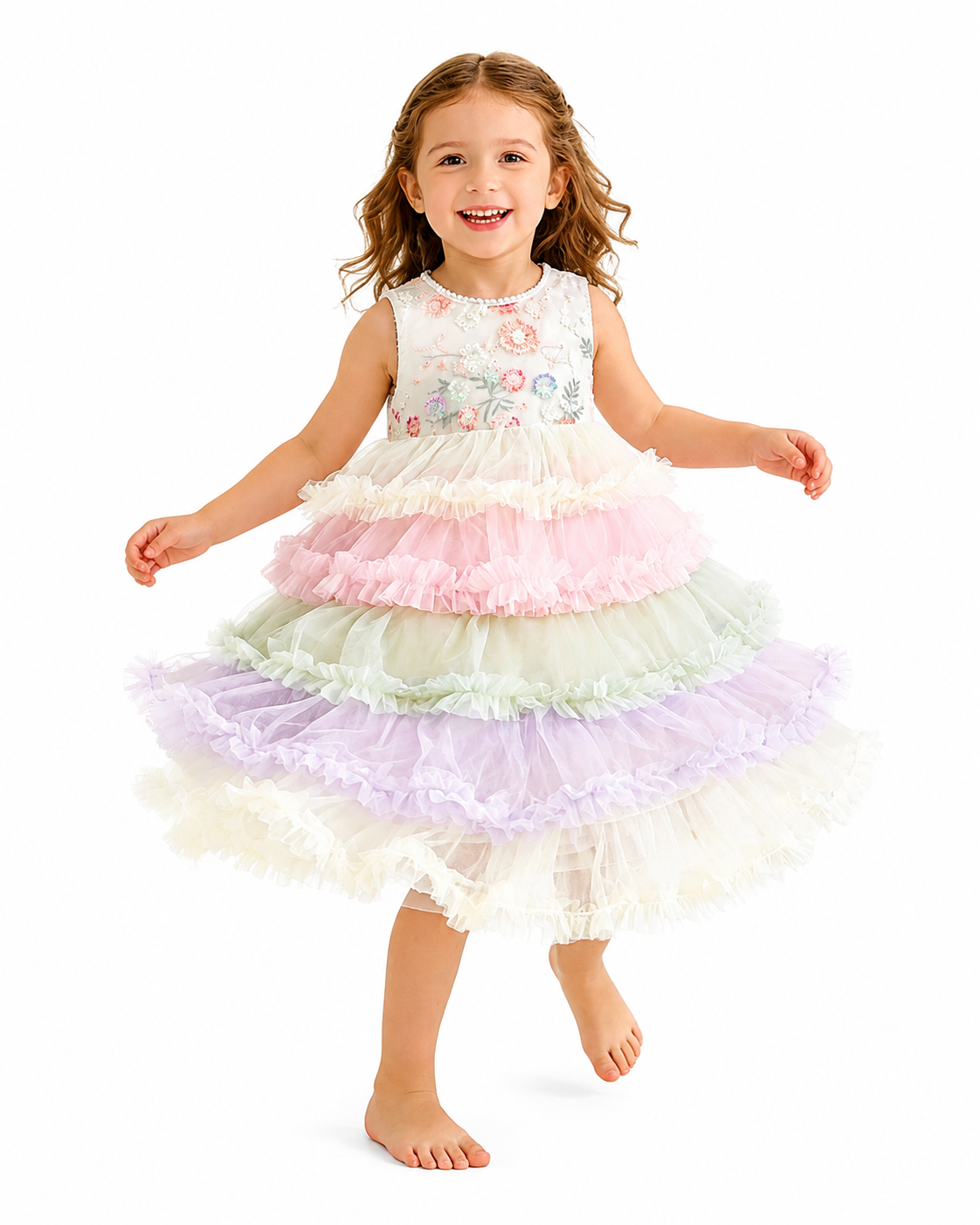 Girl wearing a pastel tiered tulle ruffle dress with a floral sleeveless bodice