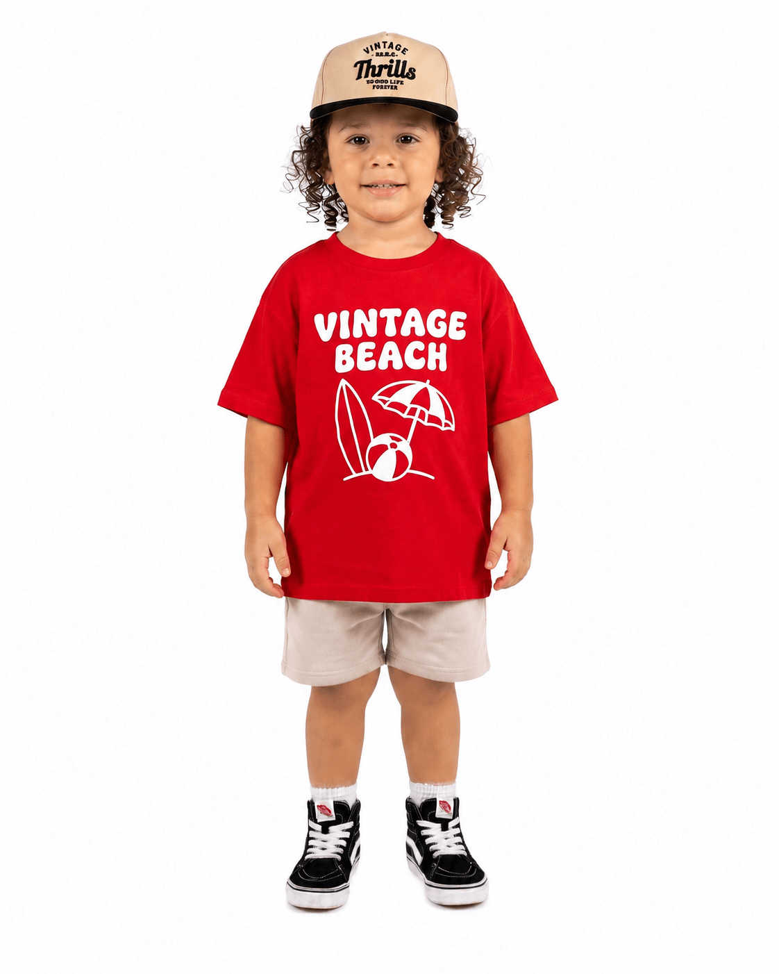 Boy wearing red Vintage Beach graphic T-shirt