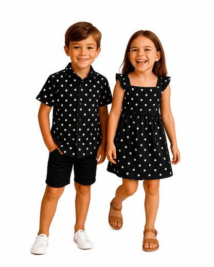 Boy and girl wearing black polka dot brother and sister matching outfits