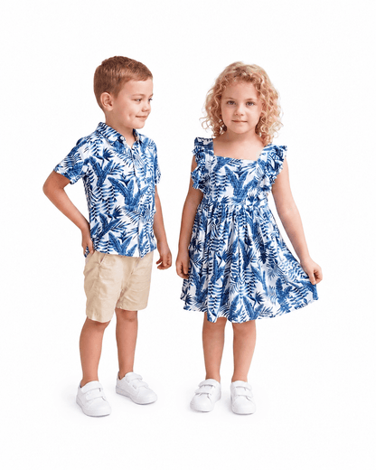 Boy and girl wearing blue palm leaf sibling matching outfits