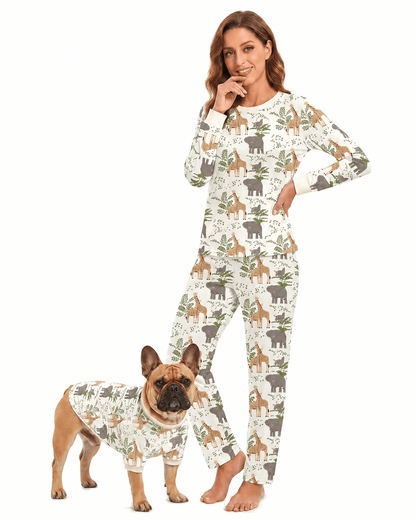 Woman and dog wearing matching nature print pajamas
