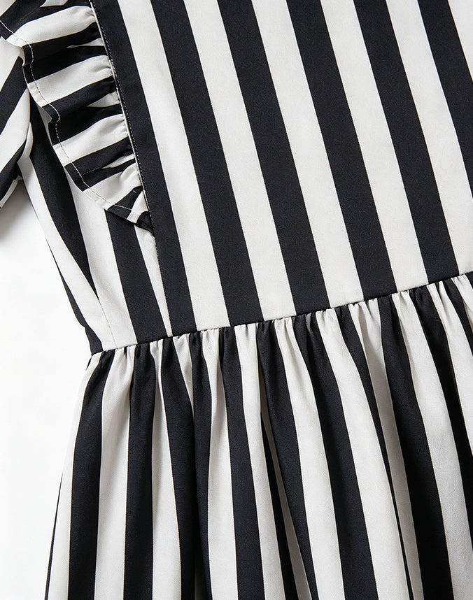 Close-up of ruffle detail on black and white striped sibling matching dress - Alice Apparel
