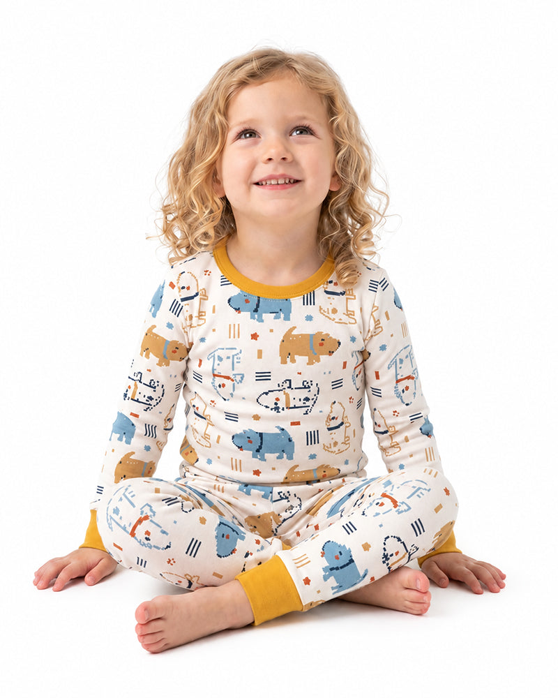 Girl wearing matching animal print two-piece kids pajamas