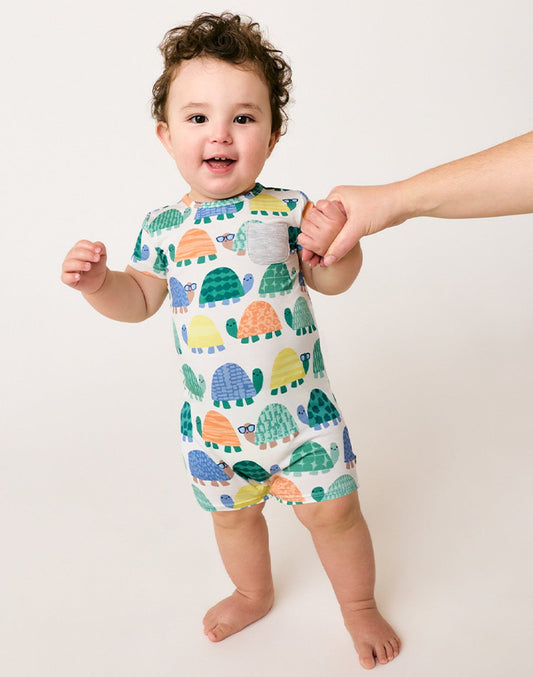 Baby standing wearing bamboo viscose tortoise print shortie zip romper - MUHONG APPAREL