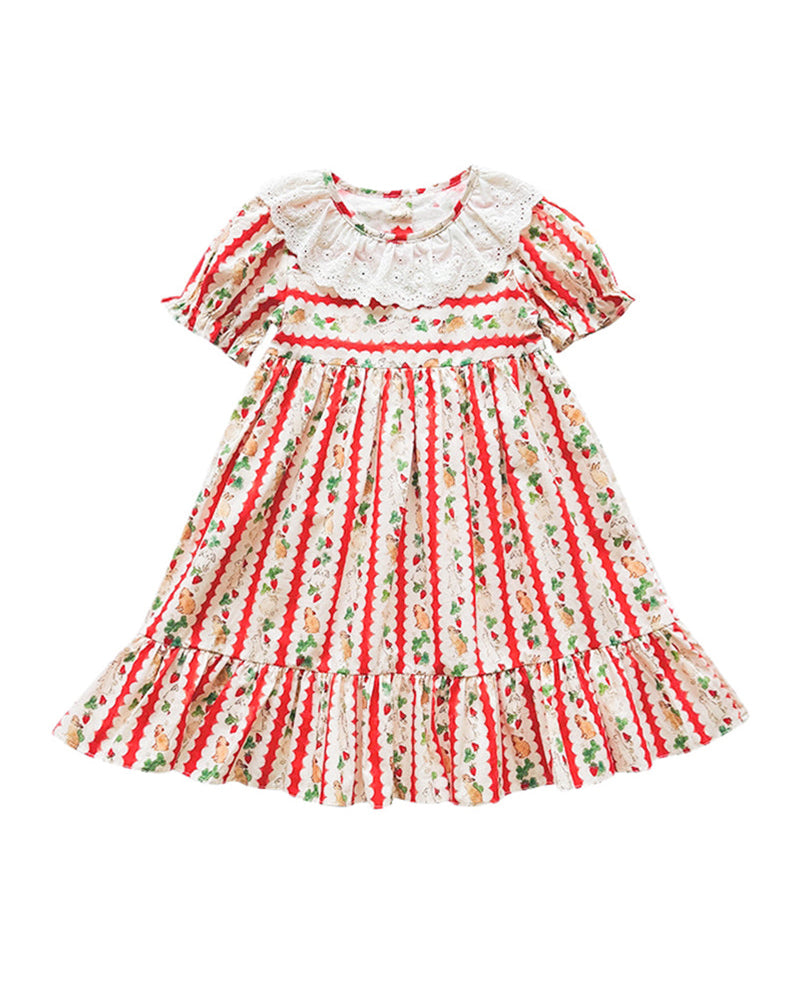 Front view of a girls bunny carrot print cotton dress with short sleeves and petal collar