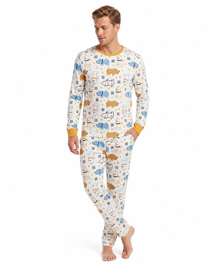 Man wearing playful print long sleeve pajama set