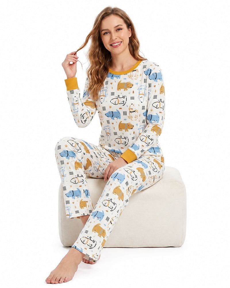 Woman wearing matching multicolor printed two-piece pajamas