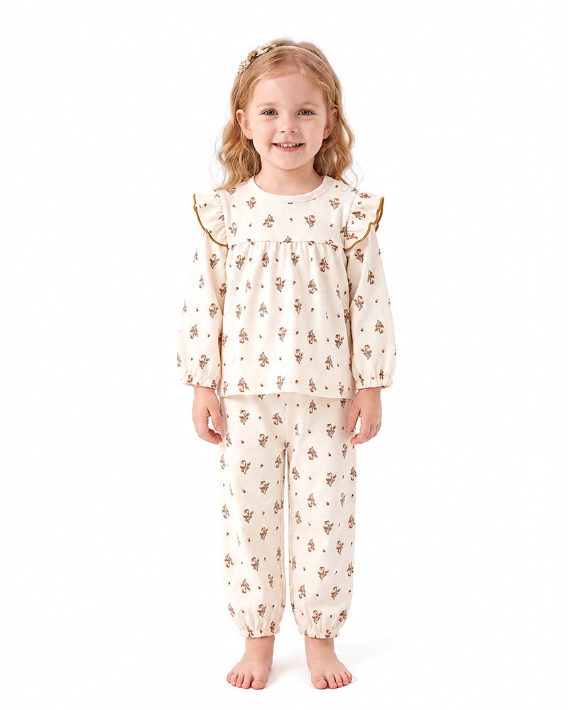 Girl wearing bamboo viscose ruffle long sleeve pajama set