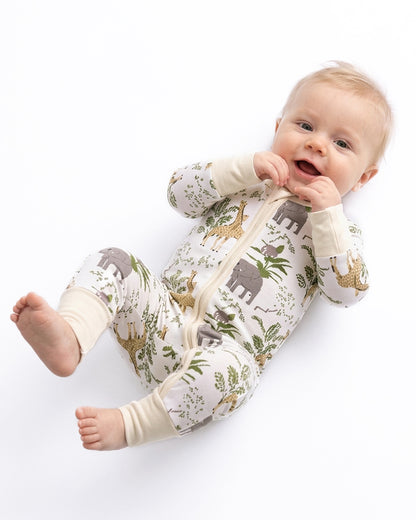 Baby wearing woodland print long sleeve pajama romper
