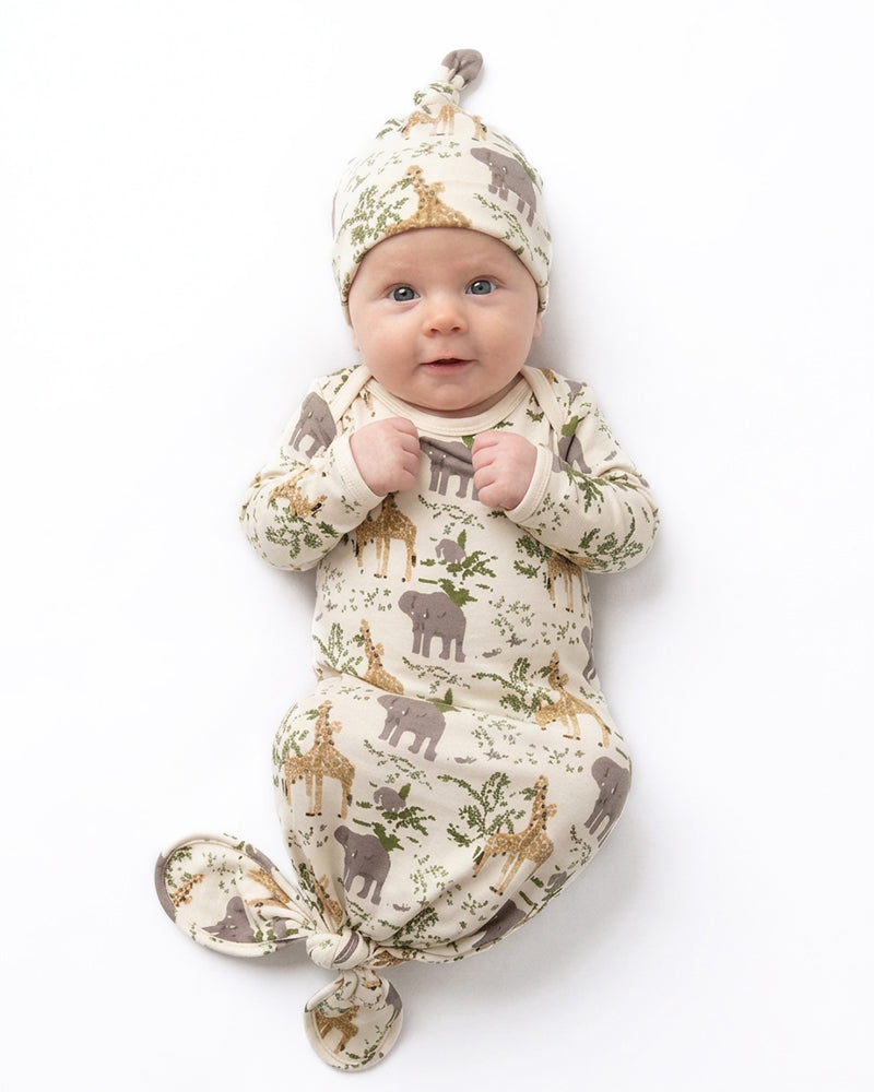 Baby wearing woodland print knotted gown with matching knot hat