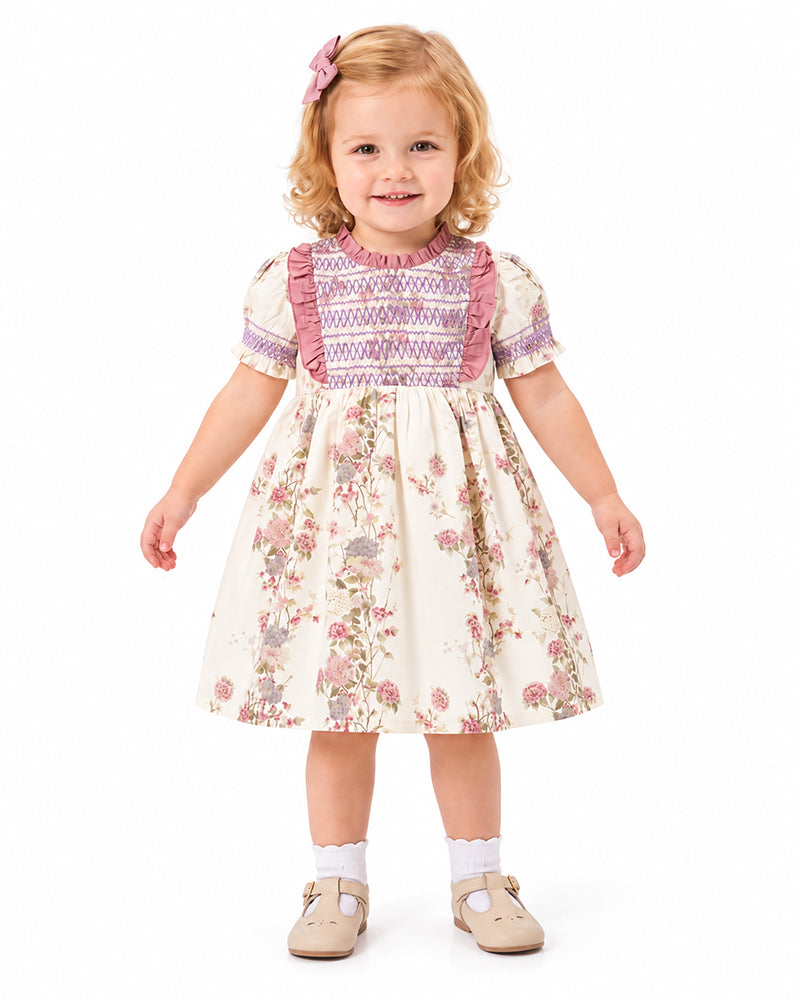 Girls floral dress with purple smocked bodice and full skirt