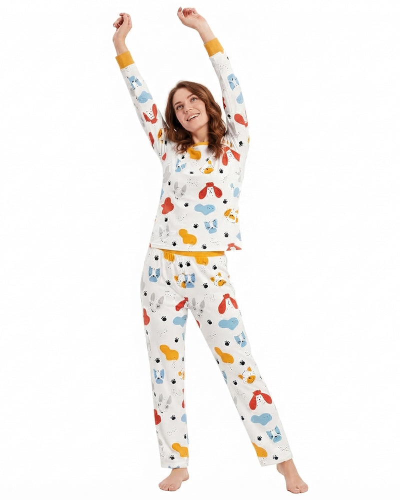 Woman wearing matching animal print two-piece pajamas