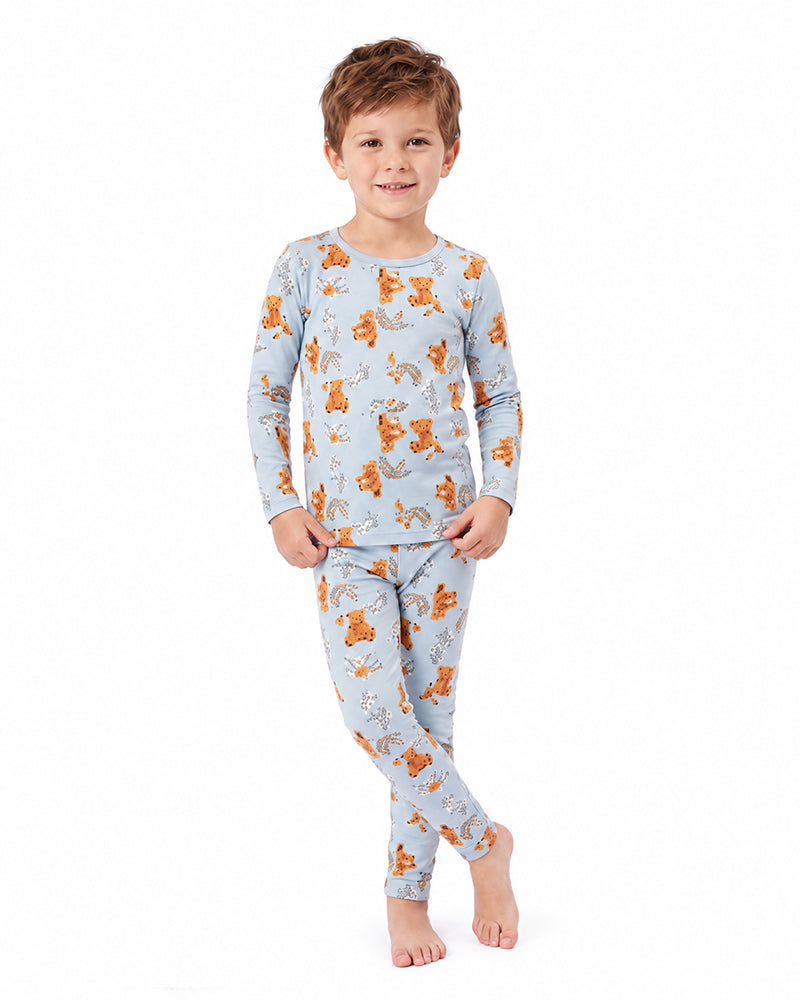 Child wearing woodland animal print long sleeve pajama set