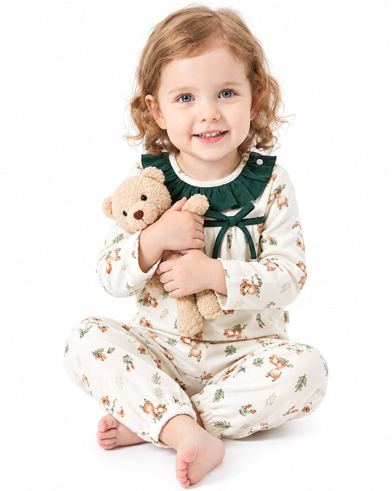 Baby wearing soft bamboo viscose sleepsuit from custom manufacturer
