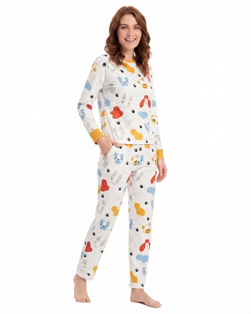 Woman wearing animal print long sleeve pajama set