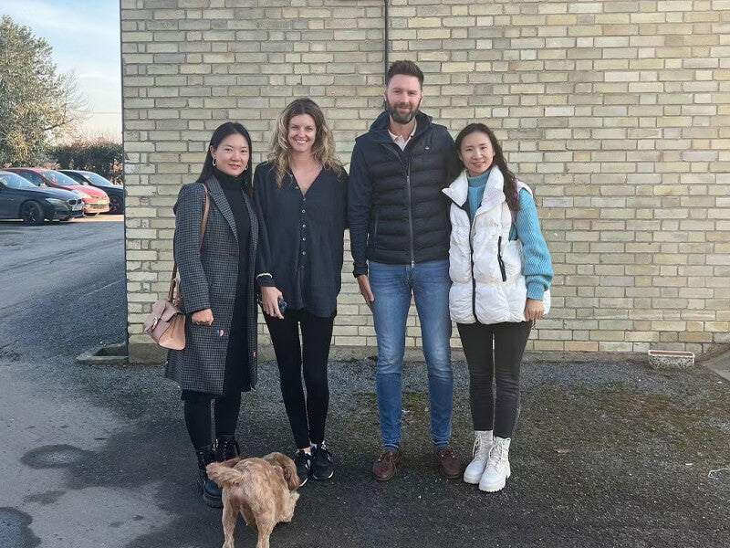 Alice Apparel team visiting buyer for project coordination