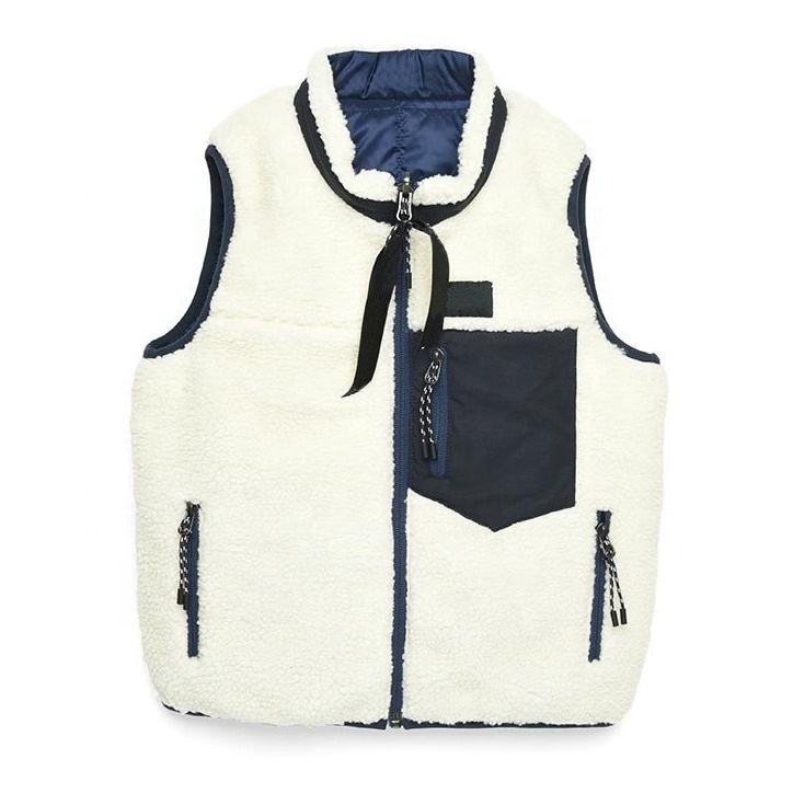 Cream baby teddy fleece vest with navy trim, chest pocket and zippered side pockets