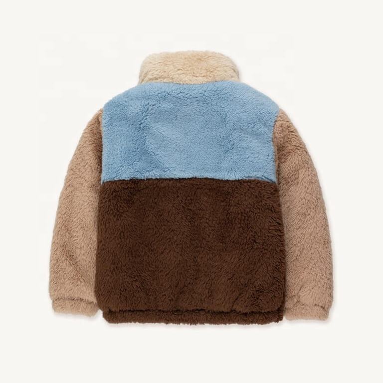 Back view of a beige blue and brown color block kids sherpa fleece jacket